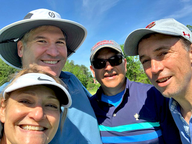 Reunion golf selfie with Debbie Harris, Mickey Harris '84, John Kowalchik '84, and Matt Wiant '84.