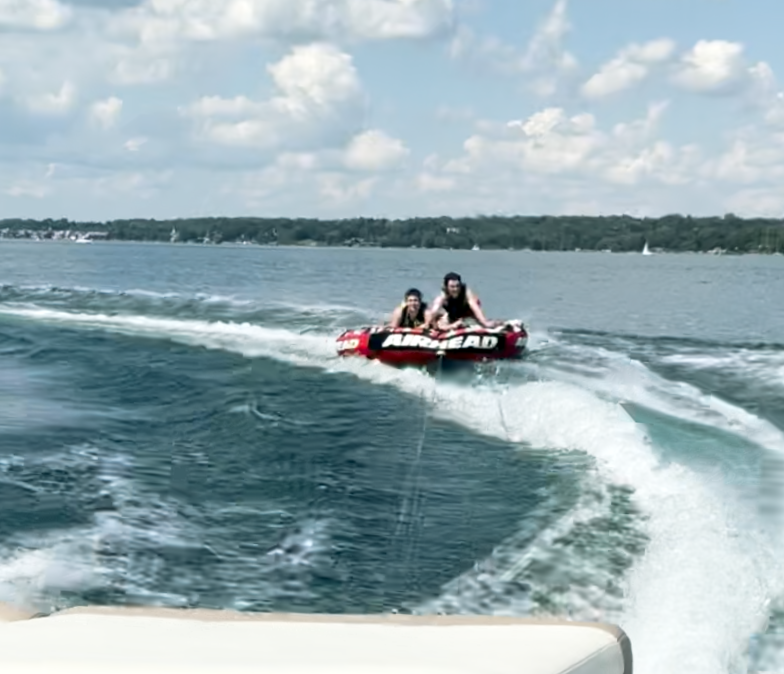Always time for move-in week fun as Andrew Scacchi '23, Tyler Angelica '25 and other brothers went tubing on Lake Skaneatles.